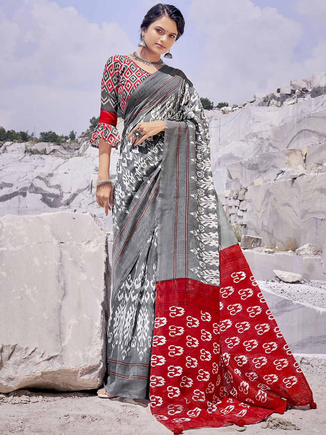 

Mitera Grey & Red Ethnic Motifs Printed Saree