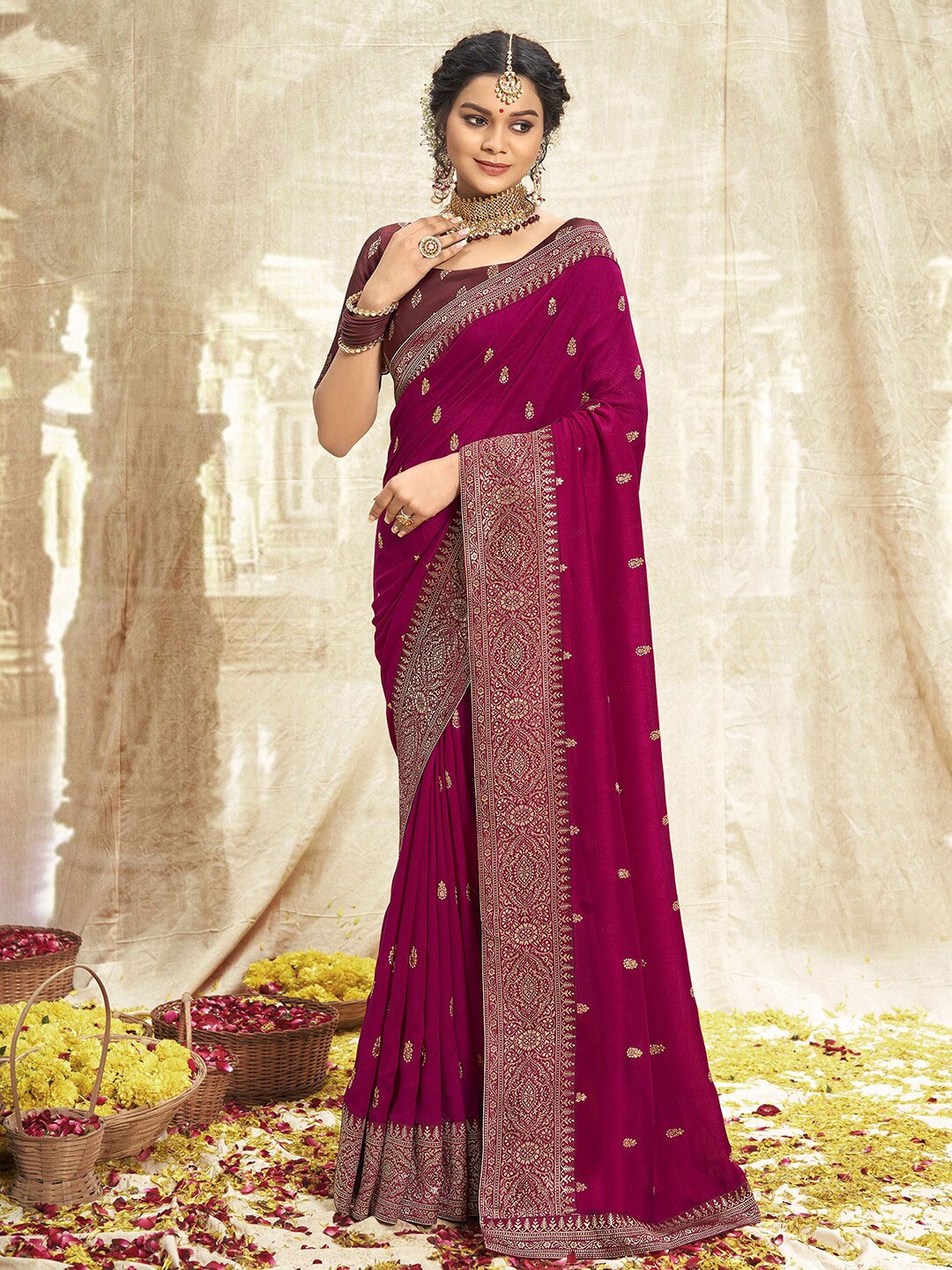 

Mitera Maroon & Gold-Toned Ethnic Motifs Embroidered Saree