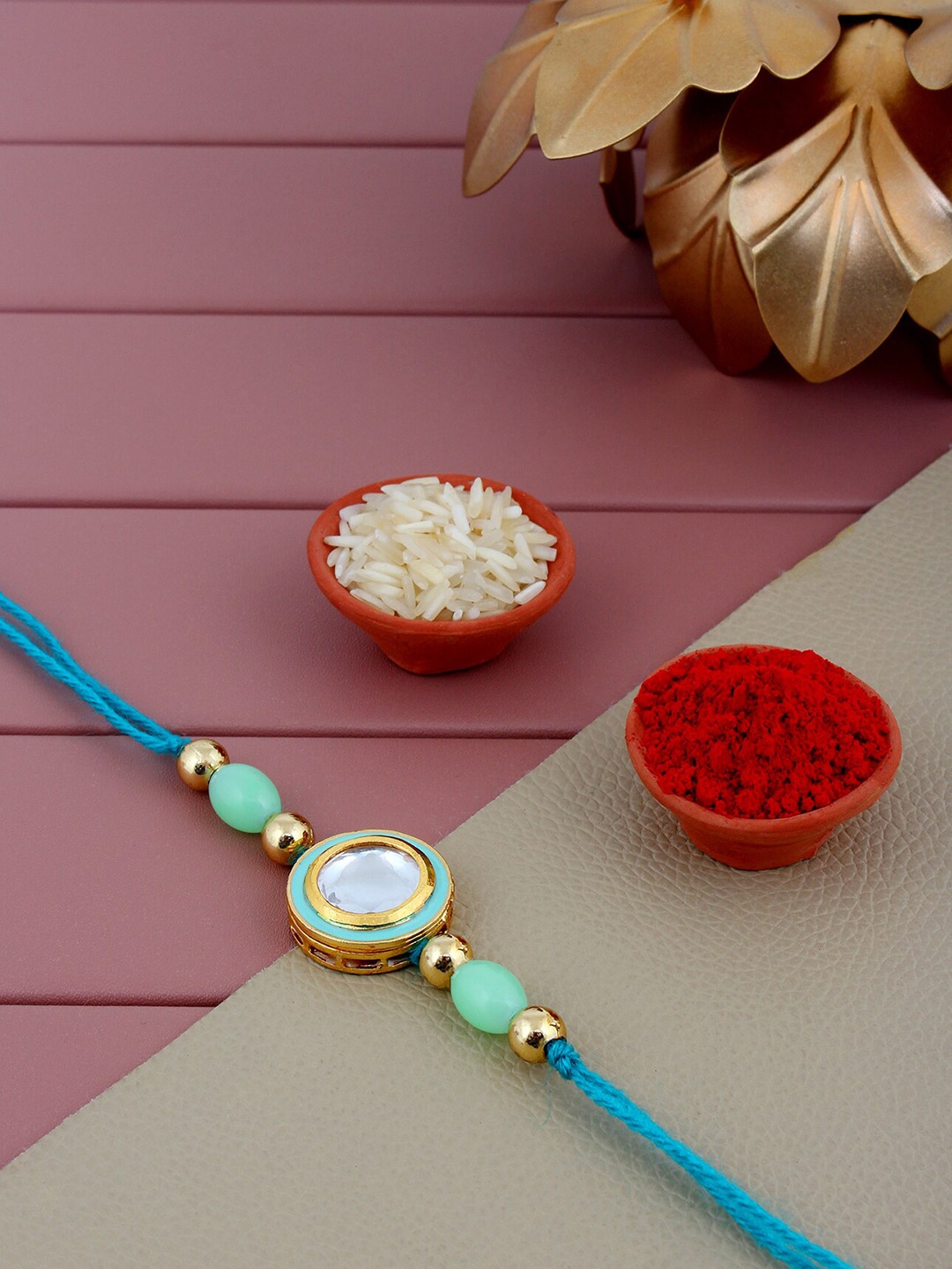 

LUCKY JEWELLERY Stone-Studded & Textured Meenakari Rakhis, Blue