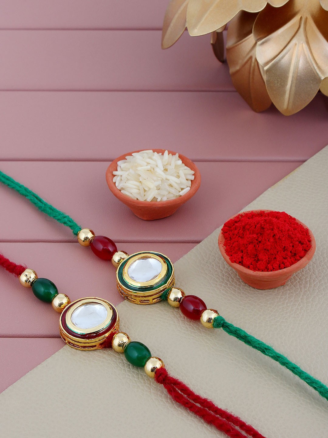 

LUCKY JEWELLERY Pack Of 2 Stone-Studded Meenakari Rakhis, Maroon