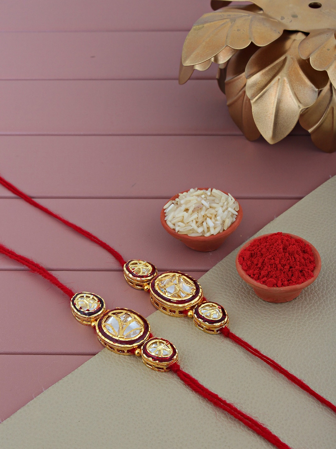 

LUCKY JEWELLERY Set Of 2 Gold-Plated Stone Studded Meenakari Rakhis