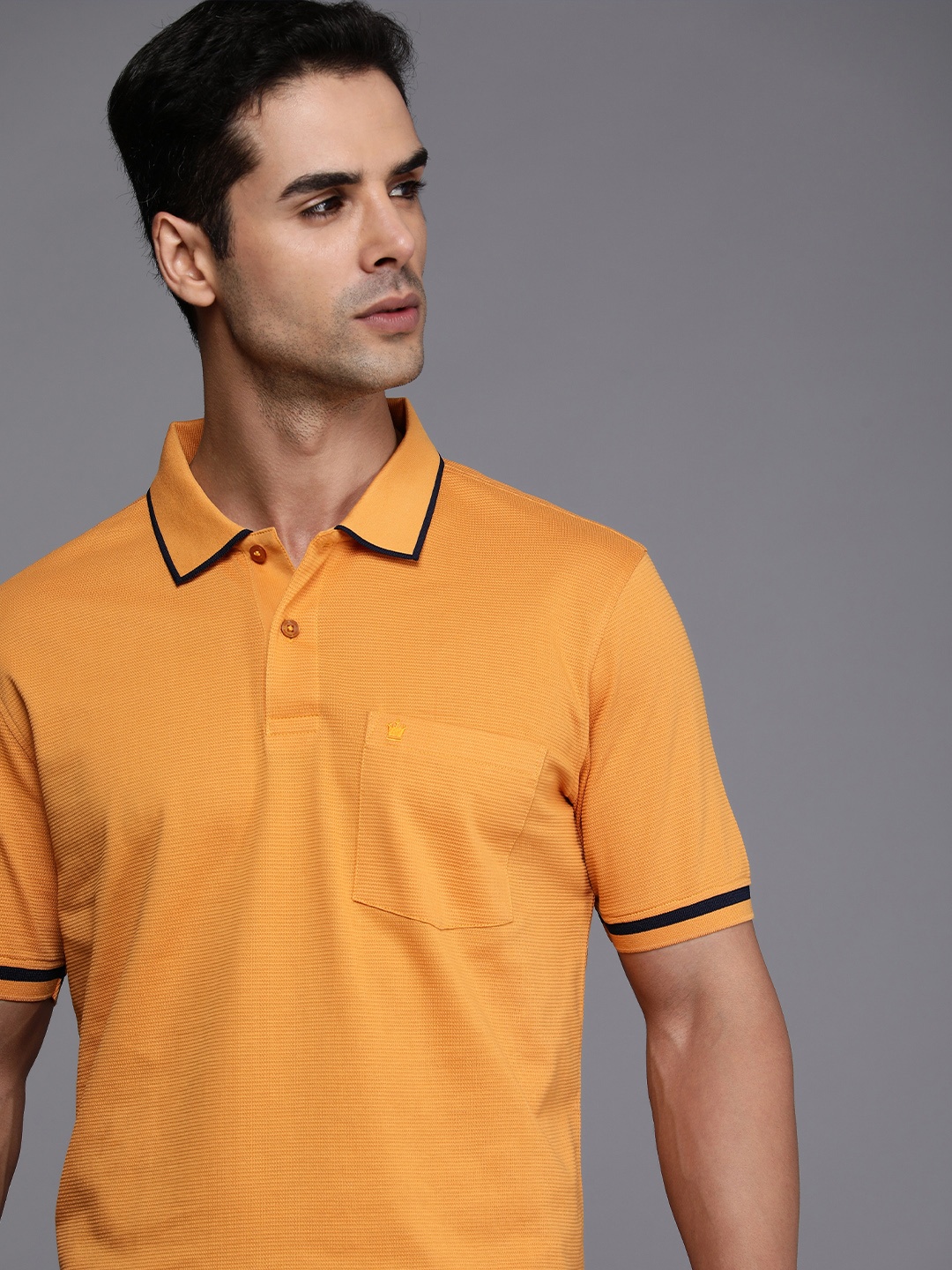

Louis Philippe Self-Design Polo Collar Pure Cotton T-shirt With Chest Pocket, Mustard