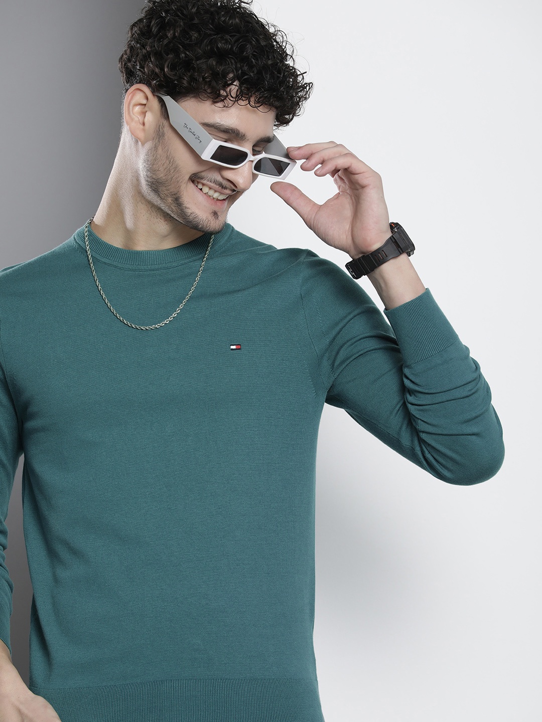 

Tommy Hilfiger Men Solid Pullover, Teal