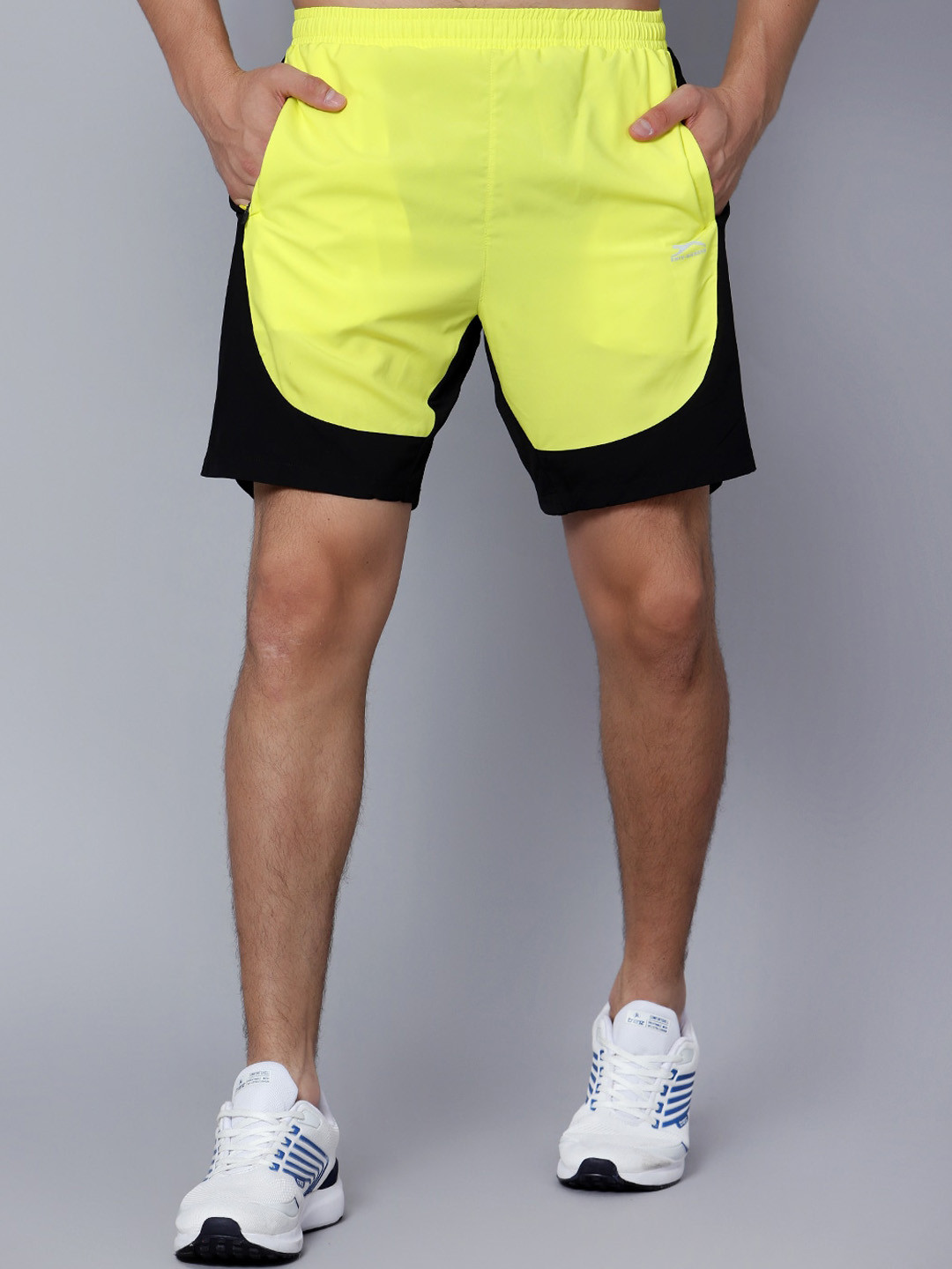 

Shiv Naresh Men Colourblocked Mid-Rise Running Sports Shorts, Yellow