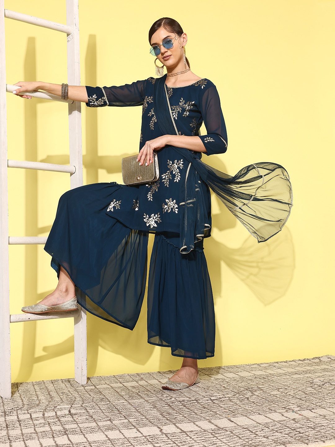 

Indo Era Women Floral Embroidered Regular Sequinned Kurta with Sharara & Dupatta, Blue
