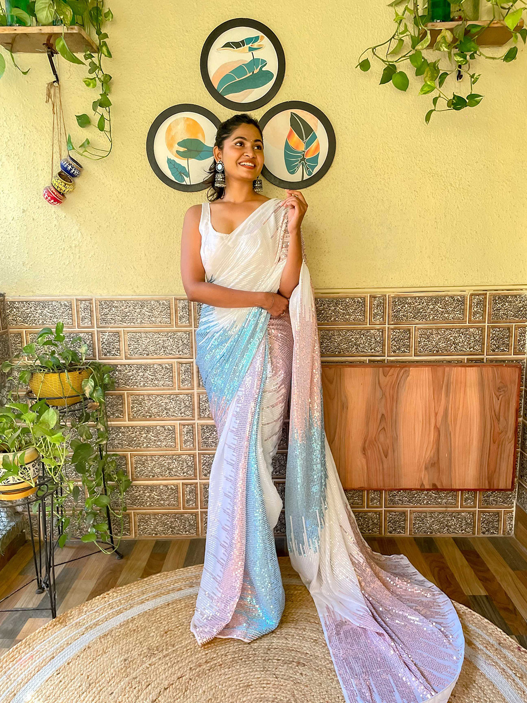 

Mitera White & Blue Embellished Sequinned Saree