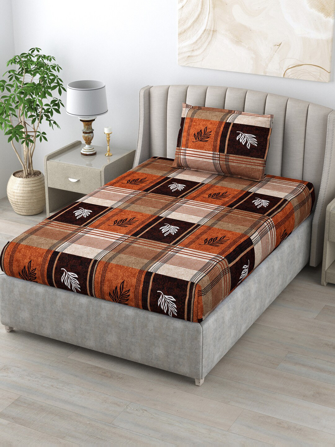 

Salona Bichona Orange & Brown Geometric Printed 144 TC Single Bedsheet With 1 Pillow Cover