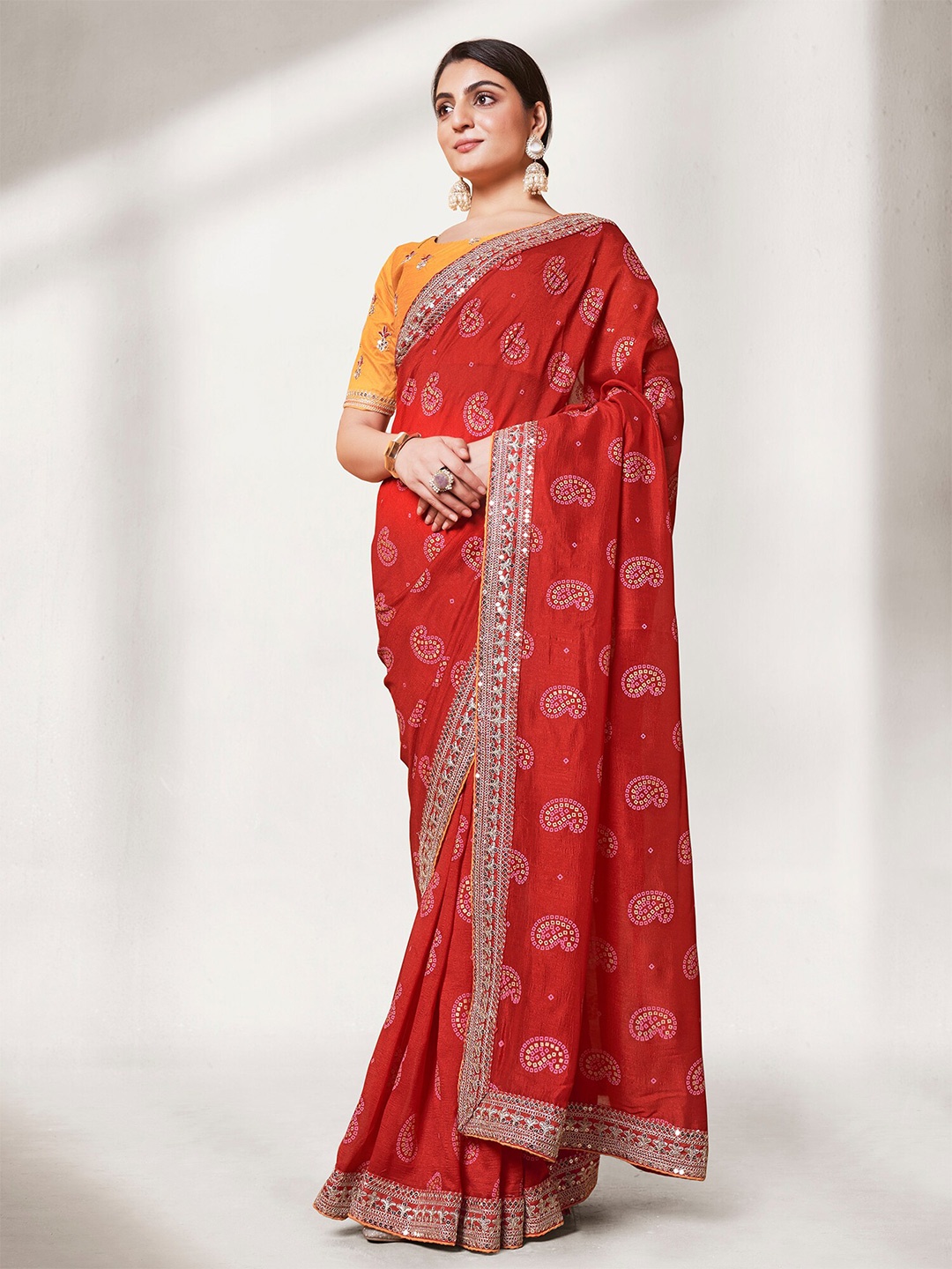 

Kalista Red & Gold-Toned Bandhani Printed & Sequinned Pure Georgette Saree