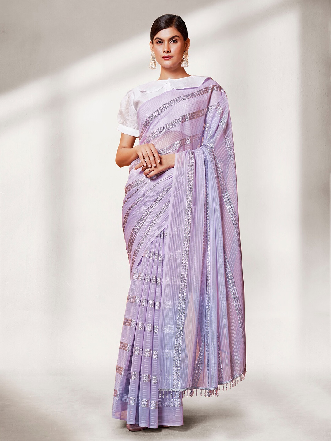 

Kalista Lavender Embellished Pure Georgette Saree
