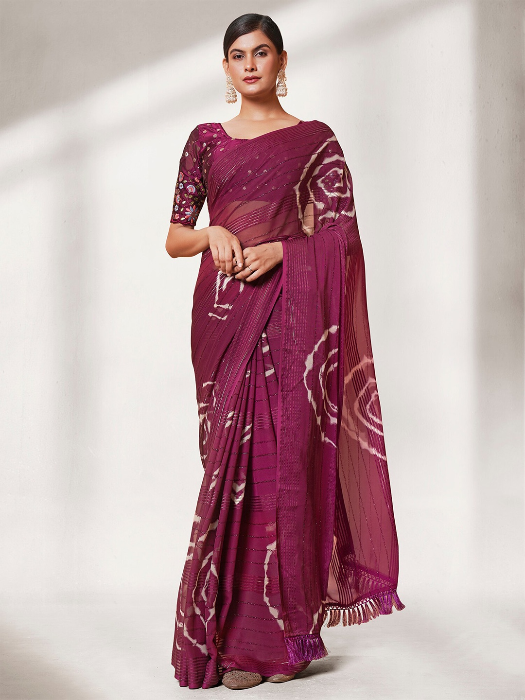

Kalista Purple & White Embellished Pure Georgette Saree