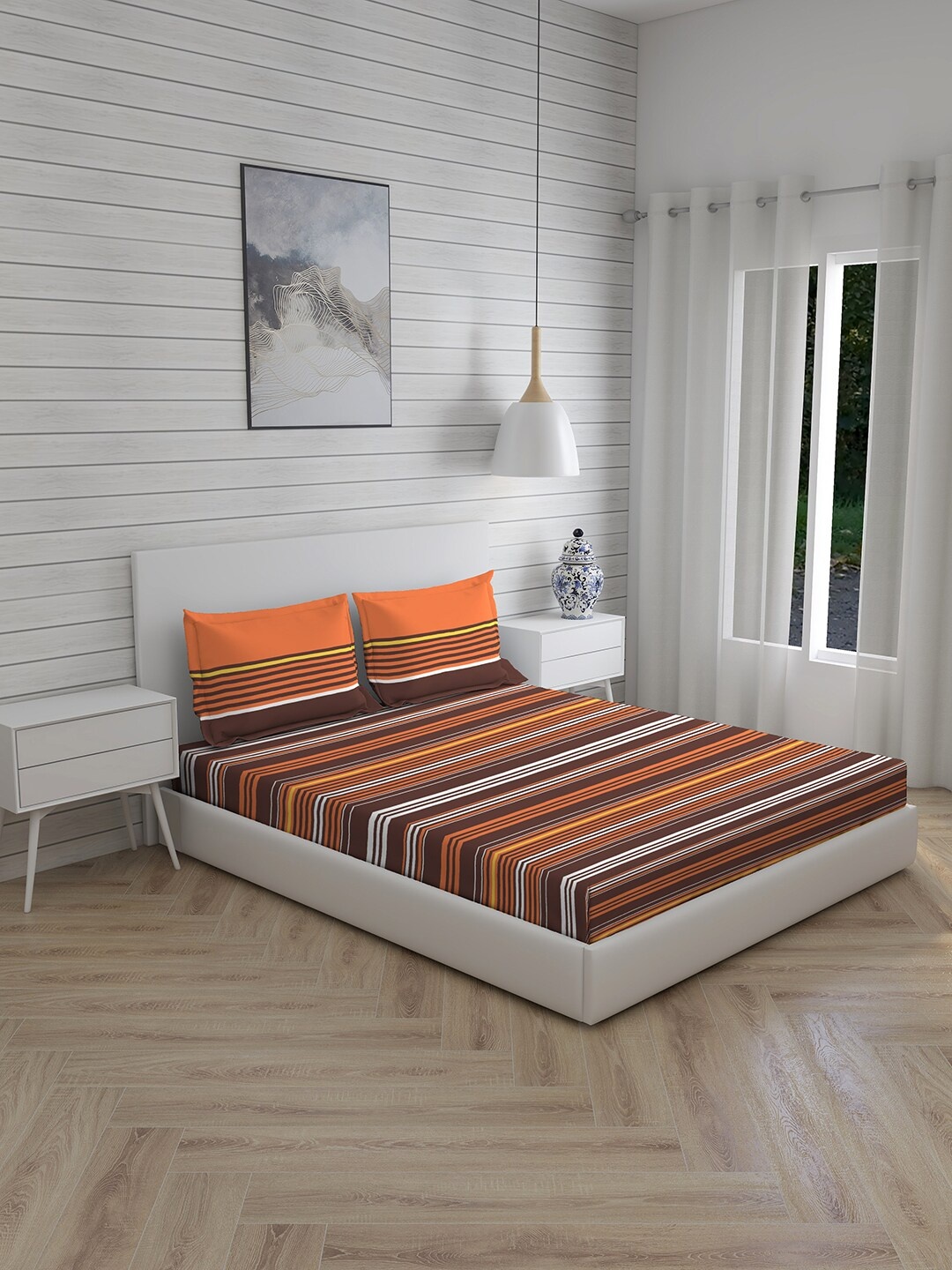 

Layers Siena Orange & Maroon Geometric 230 TC Cotton Queen Bedsheet with 2 Pillow Covers