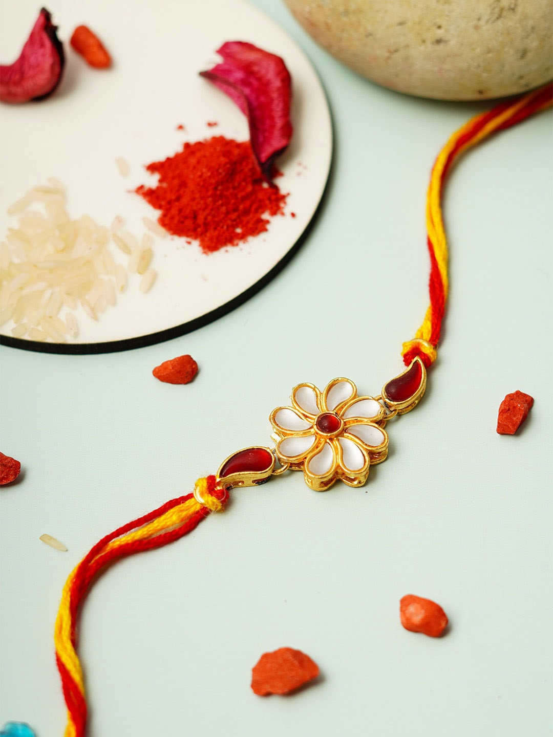 

Urmika Stone Studded Flower Shaped Thread Rakhi, Red