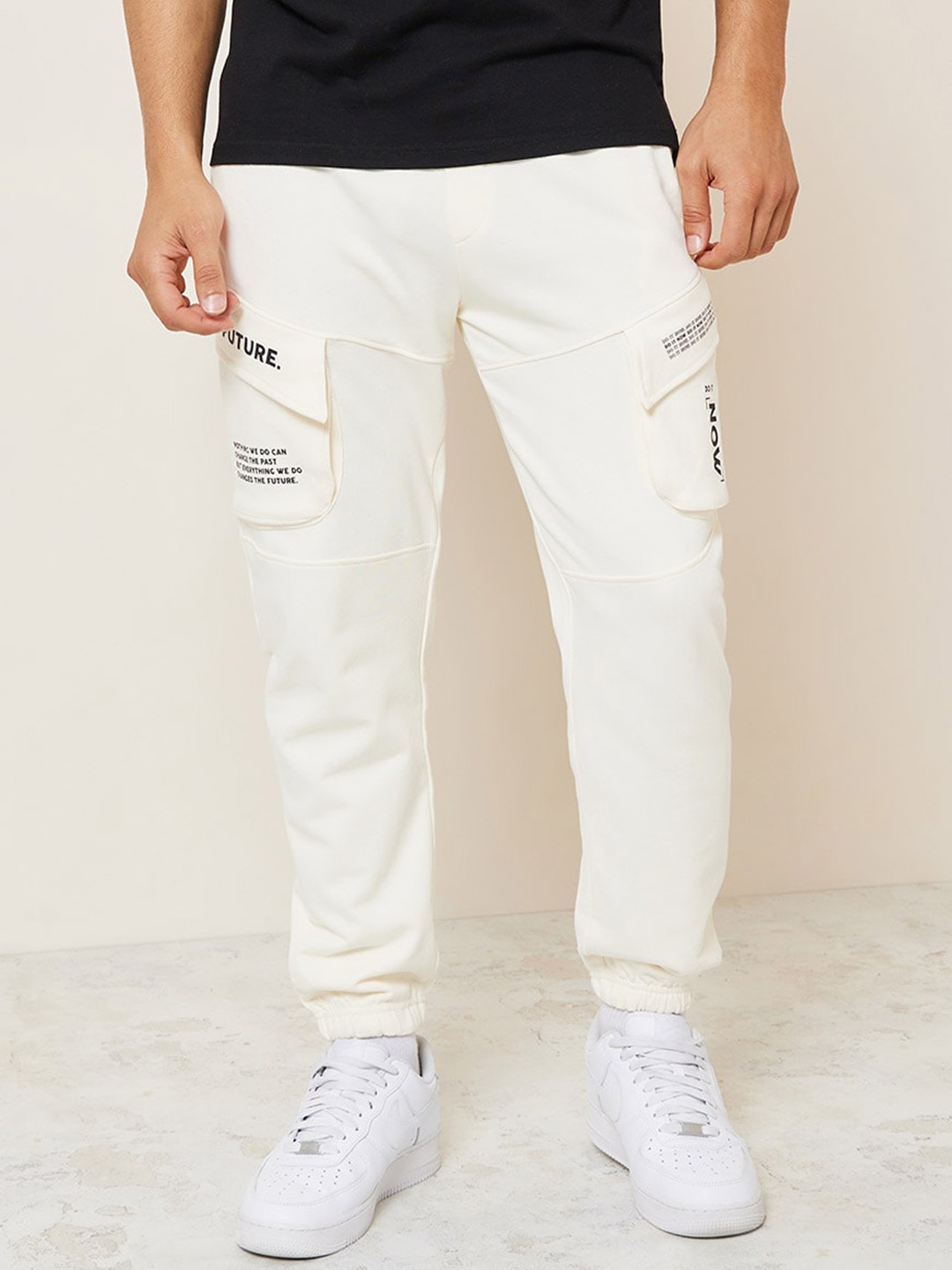 

Styli Men Typography Slim Fit Cargo Pure Cotton Joggers, Cream