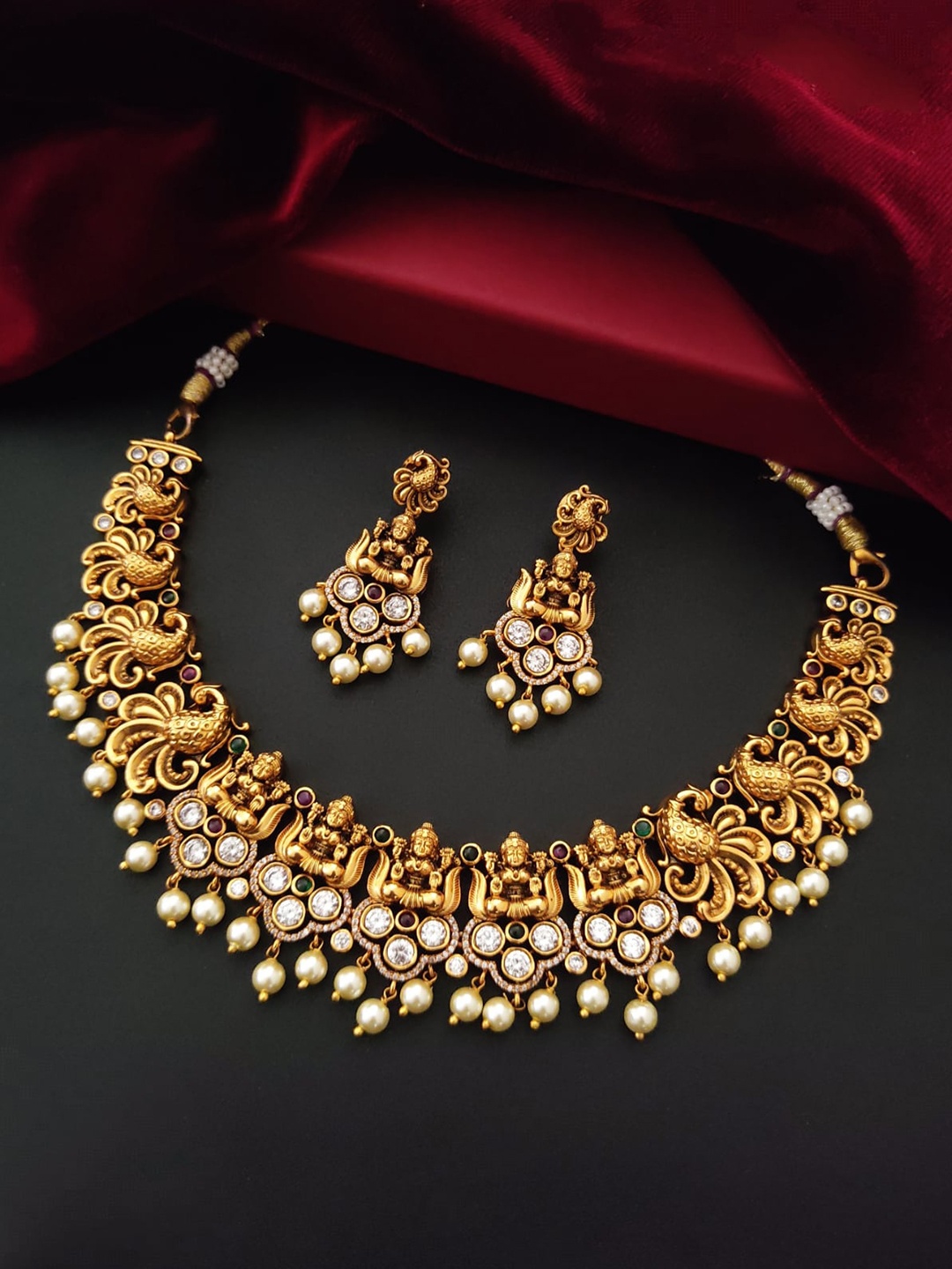

Pihtara Jewels Gold-Plated Stone-Studded & Beaded Jewellery Set