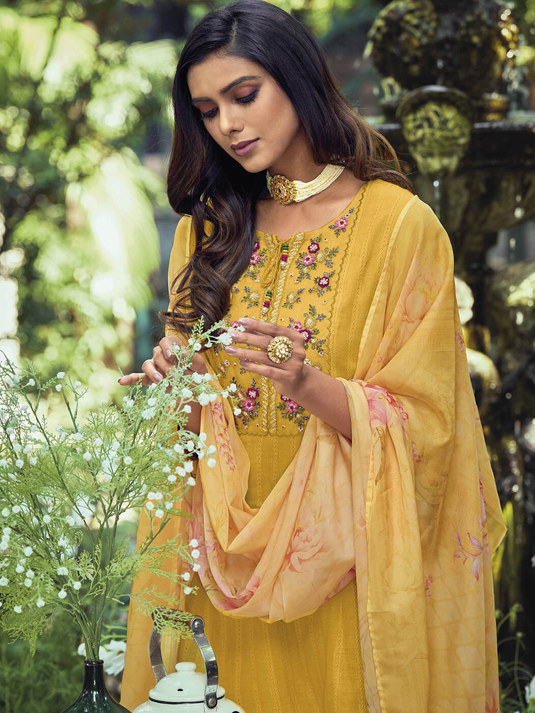 

Indo Era Yellow Yoke Design Thread Work Pure Cotton Kurta With Trousers & Dupatta