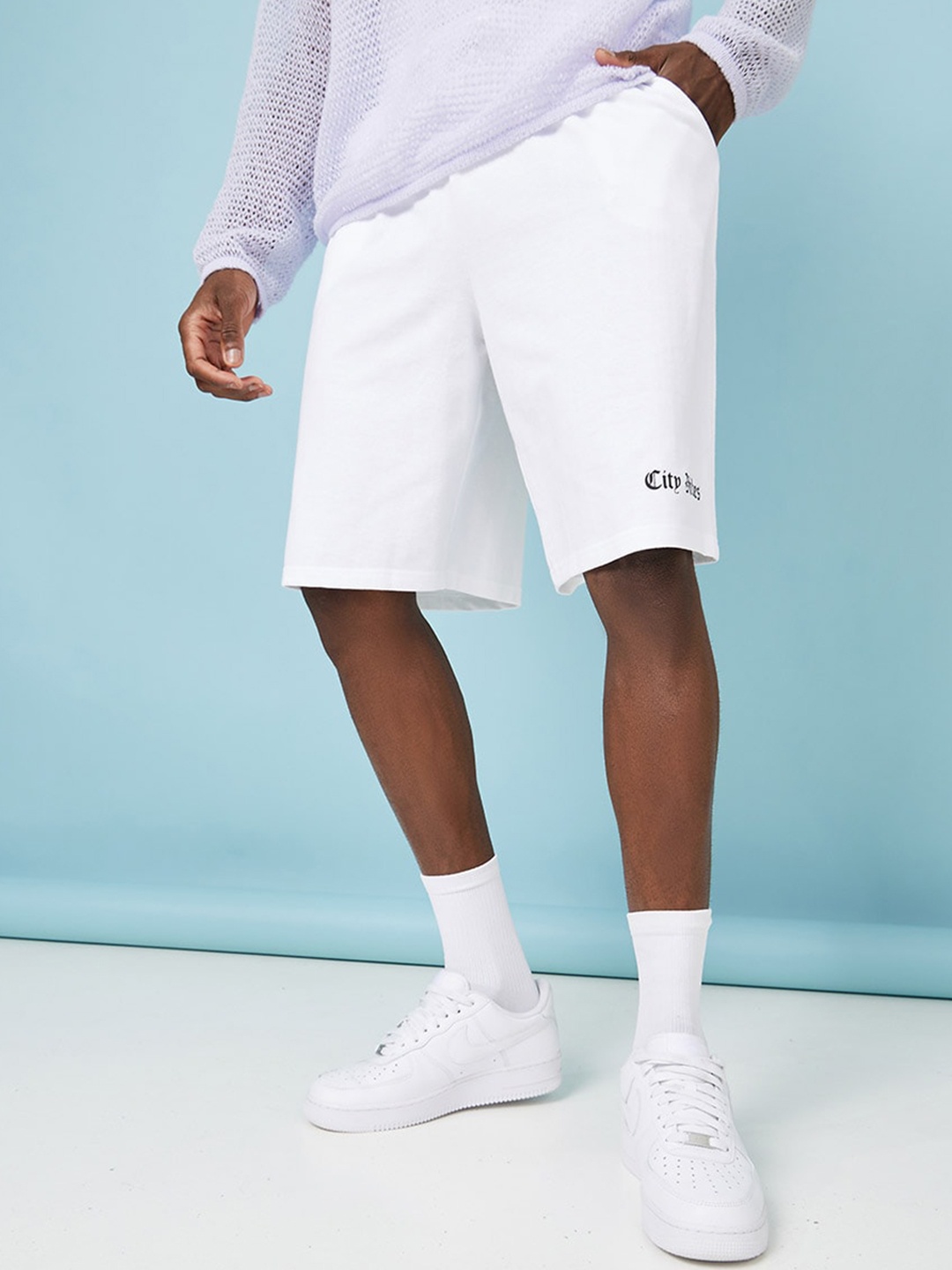 

Styli Men City Vibes Printed Oversized Sports Shorts, White