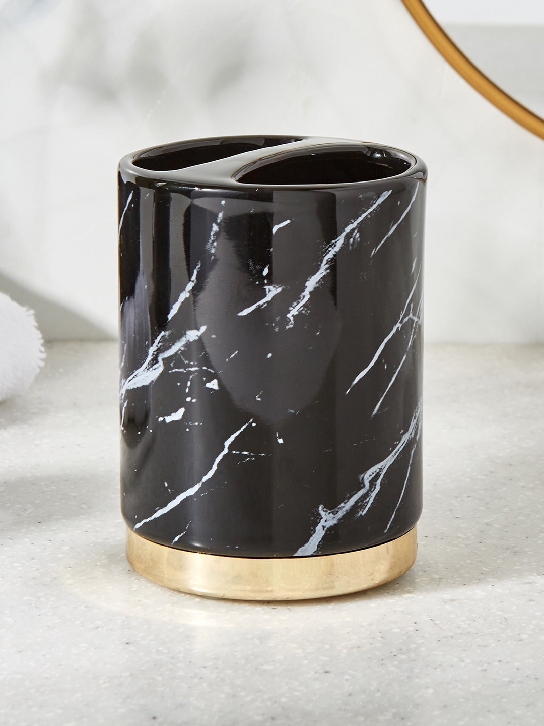 

Home Centre Aubree Dapple Black Ceramic Tooth Brush Holder