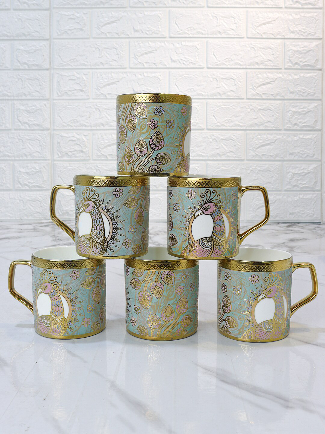 

Femora Crowned Peacock Green 6-Pieces Ethnic Motifs Printed Ceramic Glossy Mugs 180ml Each, Gold
