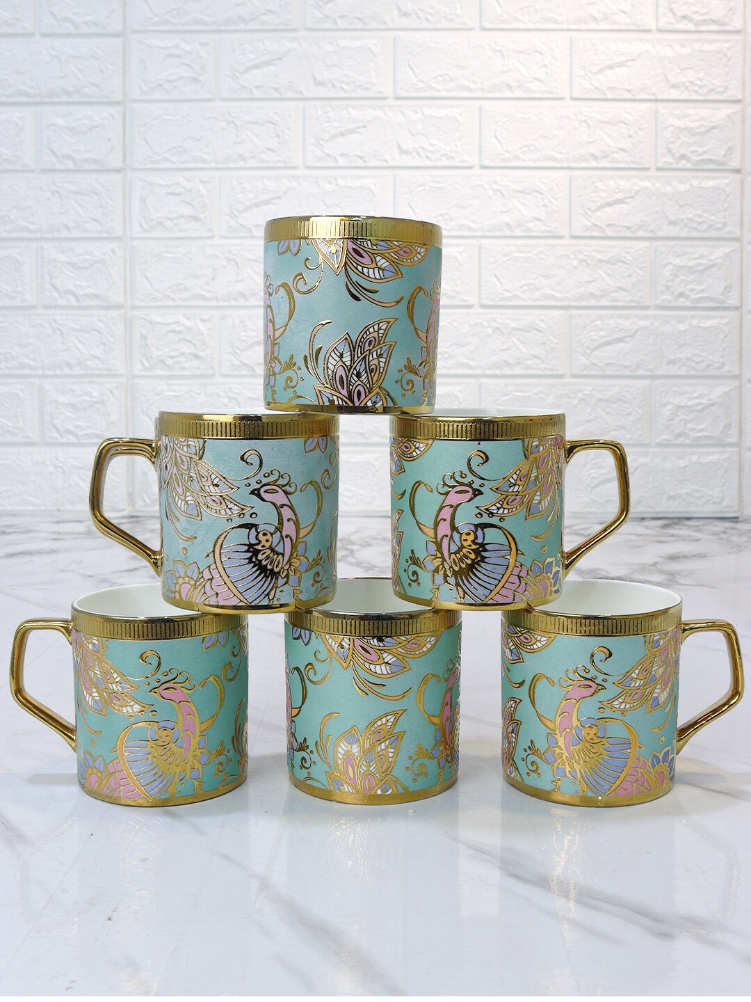 

Femora Wandering Peacock Blue & Pink 6-Pieces Ethnic Motifs Ceramic Glossy Mugs 180ml Each