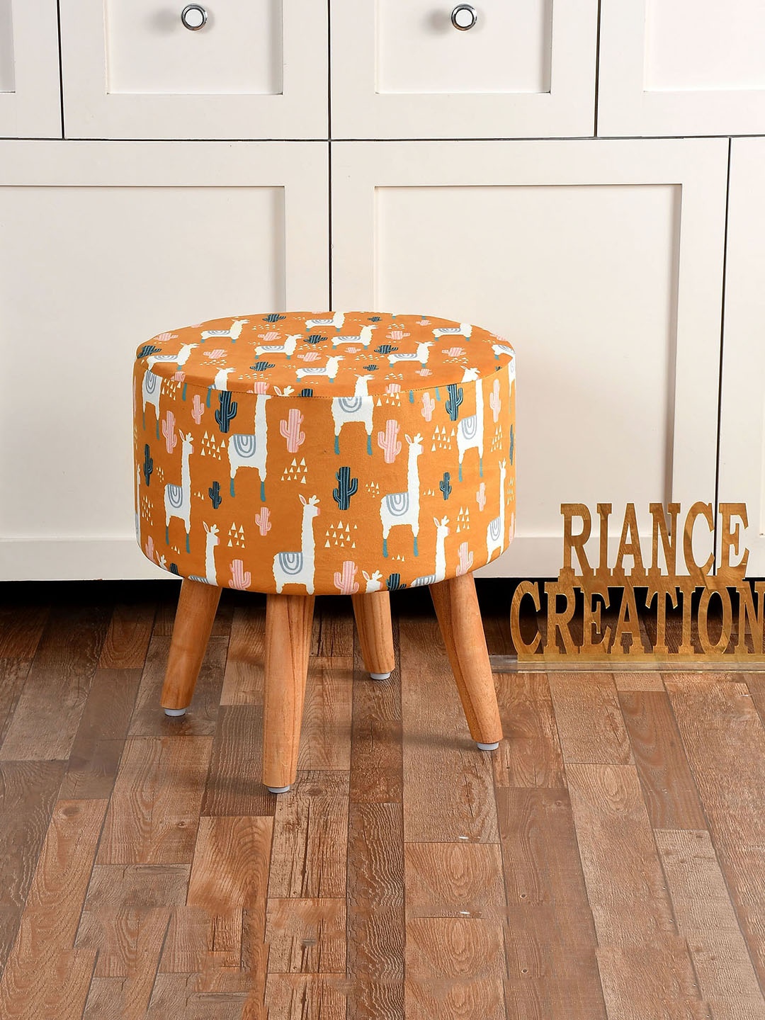 

RIANCE CREATIONS Orange & White Printed Round Ottoman