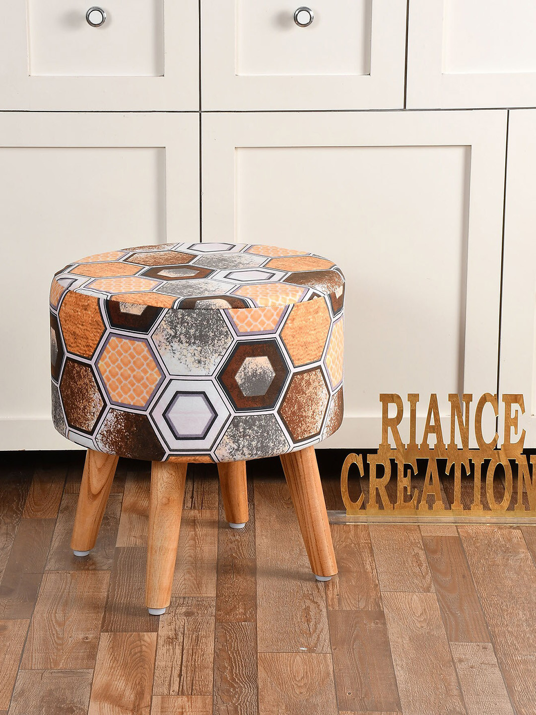 

RIANCE CREATIONS Orange & Brown Printed Wooden Round Ottoman