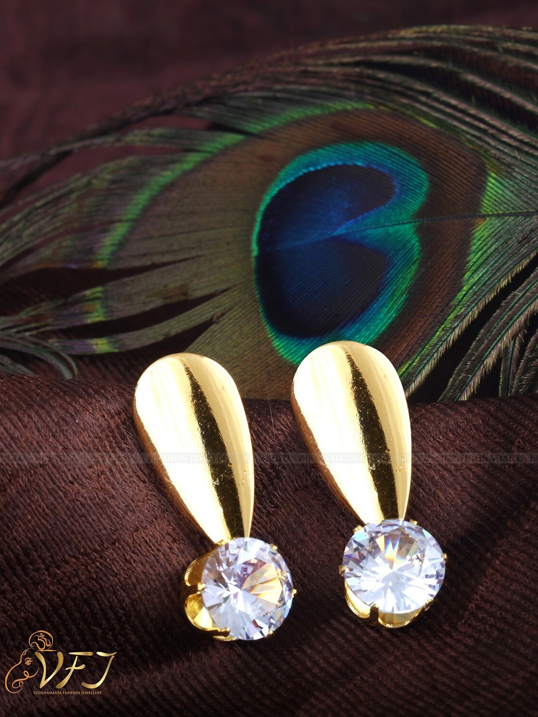 

Vighnaharta Gold-Plated Floral Studs Earrings