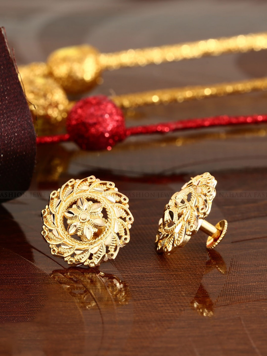 

Vighnaharta Gold-Plated Floral Studs Earrings