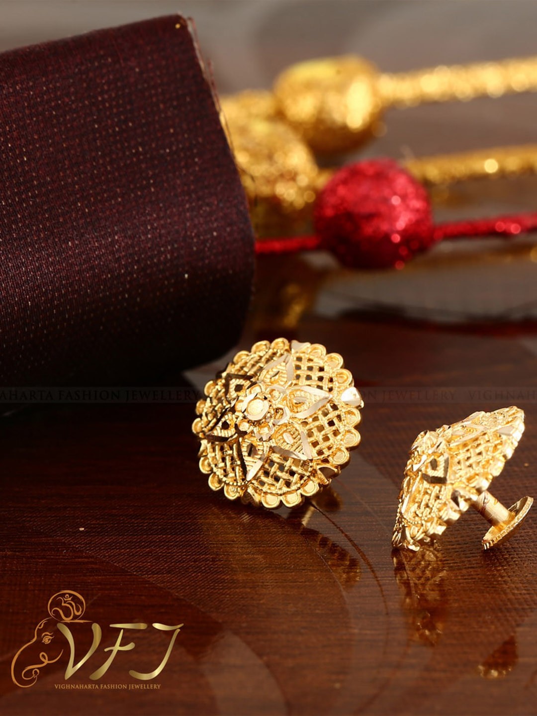 

Vighnaharta Gold-Plated Floral Studs Earrings