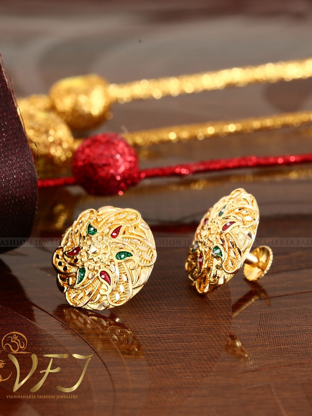

Vighnaharta Gold-Plated Floral Studs Earrings