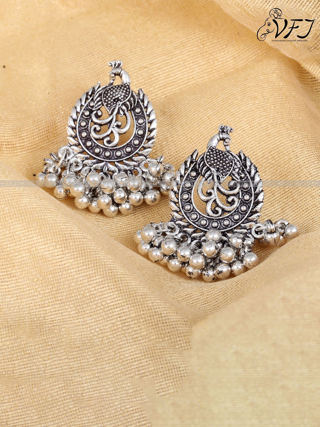 

Vighnaharta Gold-Plated Floral Studs Earrings