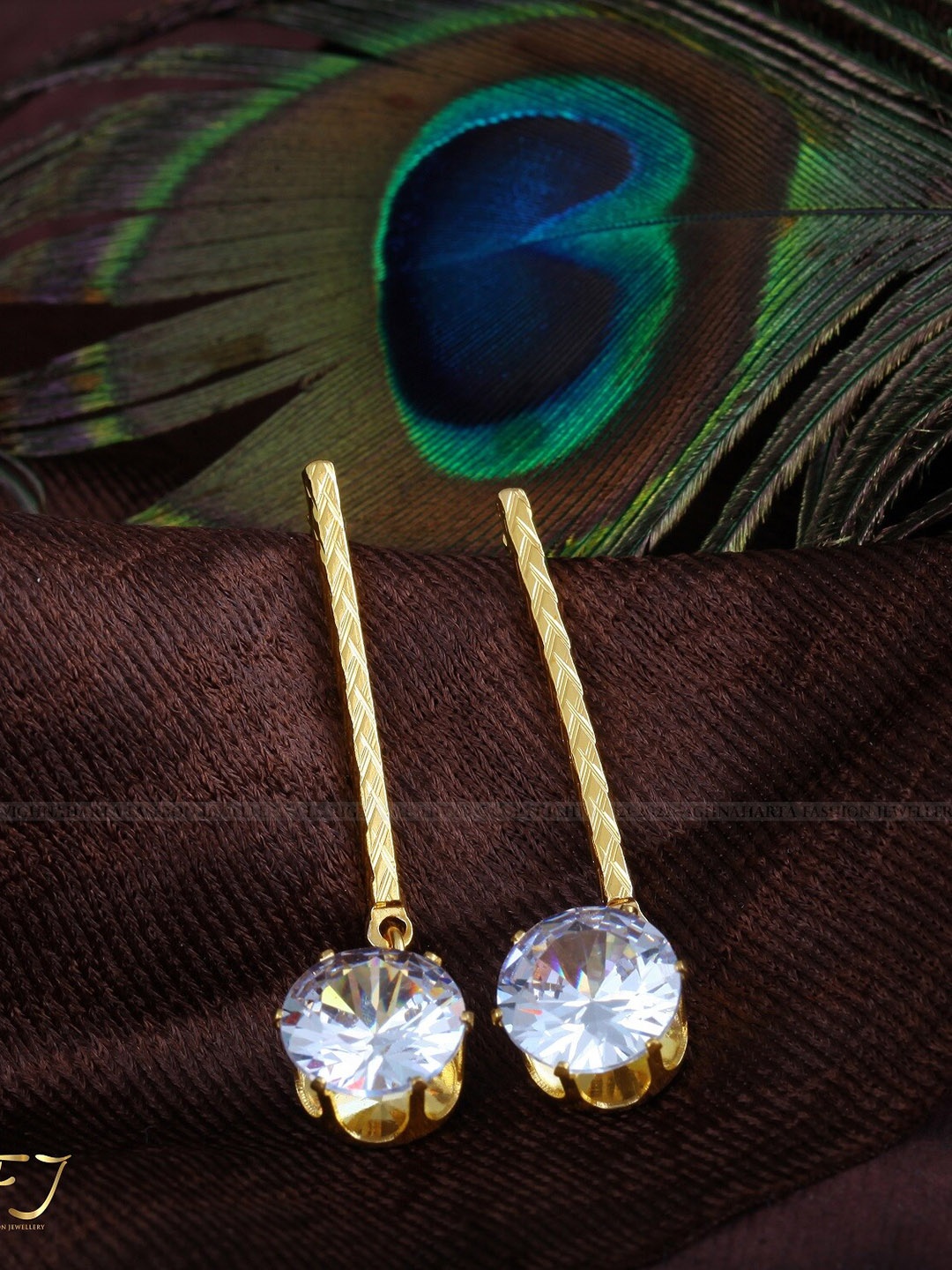 

Vighnaharta Gold-Plated Cubic Zirconia Floral Drop Earrings