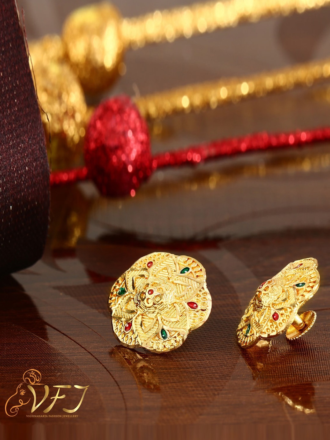 

Vighnaharta Gold-Plated Floral Studs Earrings