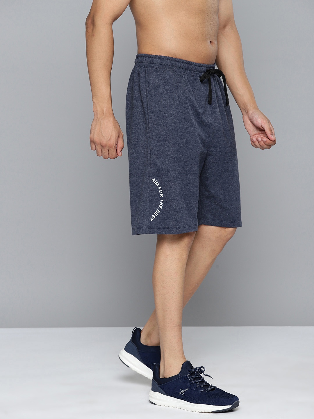 

HRX by Hrithik Roshan Men Lifestyle Typography Printed Bio Wash Sports Shorts, Navy blue