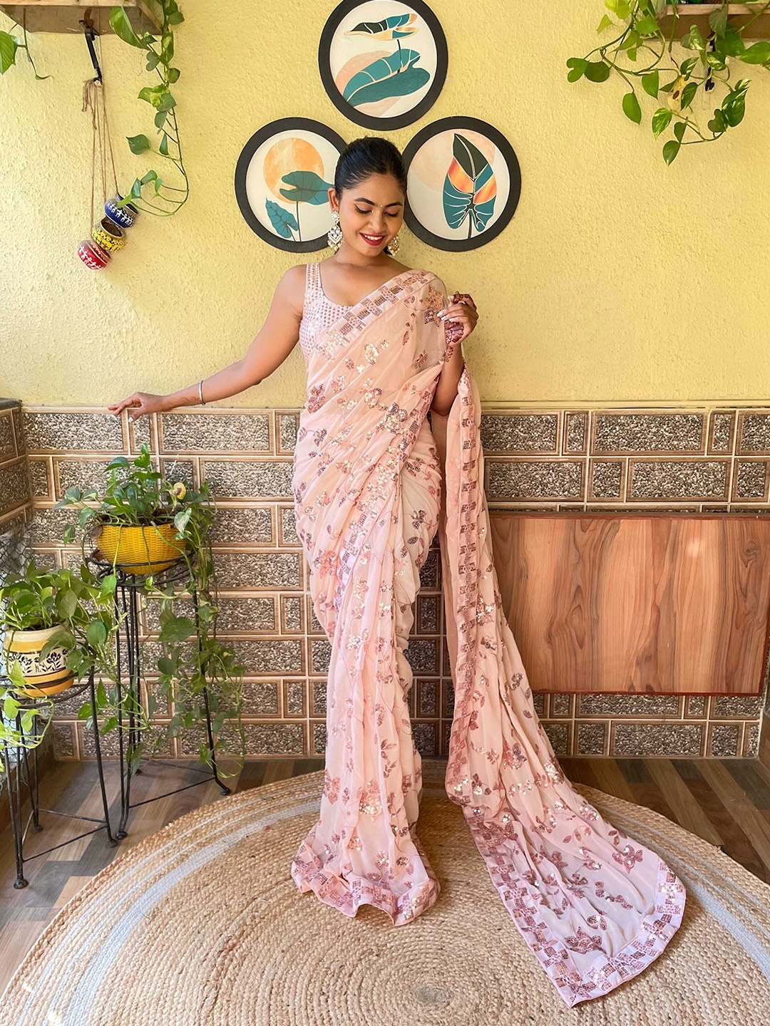 

Mitera Peach-Coloured Embellished Sequinned Saree