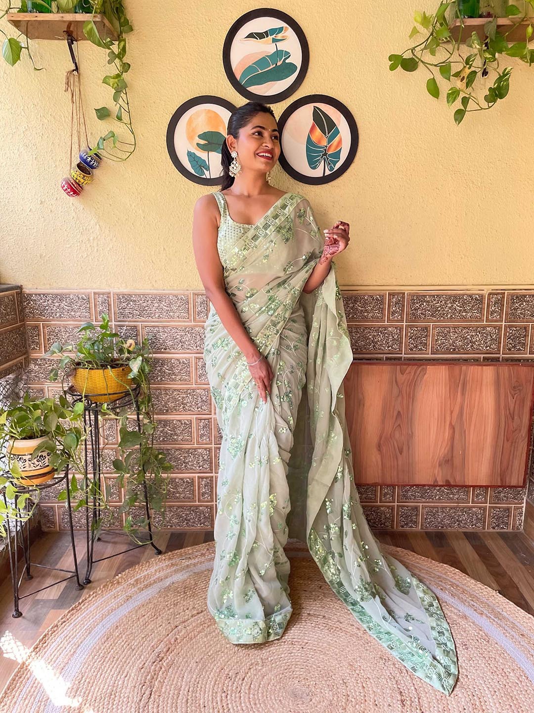 

Mitera Green Embellished Sequinned Saree