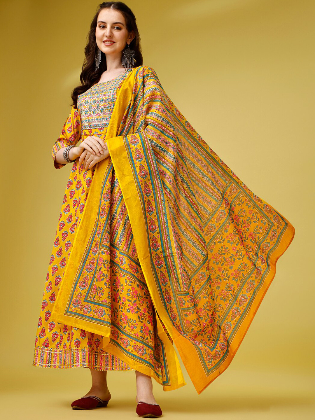 

Ziva Fashion Ethnic Motifs Printed Anarkali Kurta With Trousers & Dupatta, Mustard