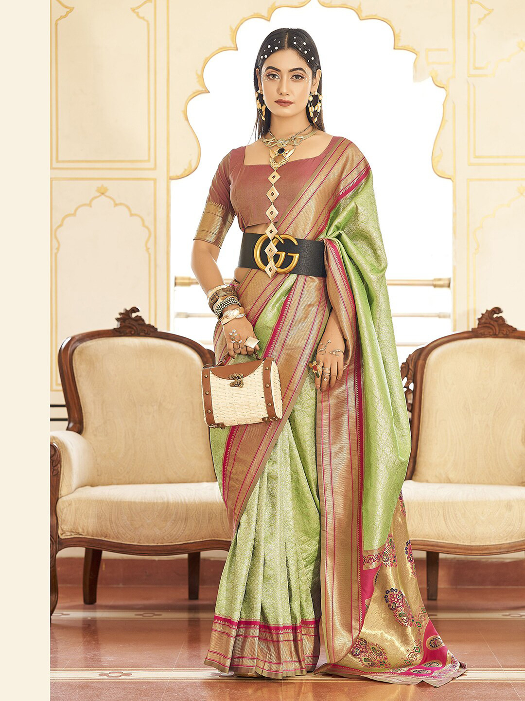 

Satrani Green & Pink Ethnic Motifs Woven Design Zari Saree