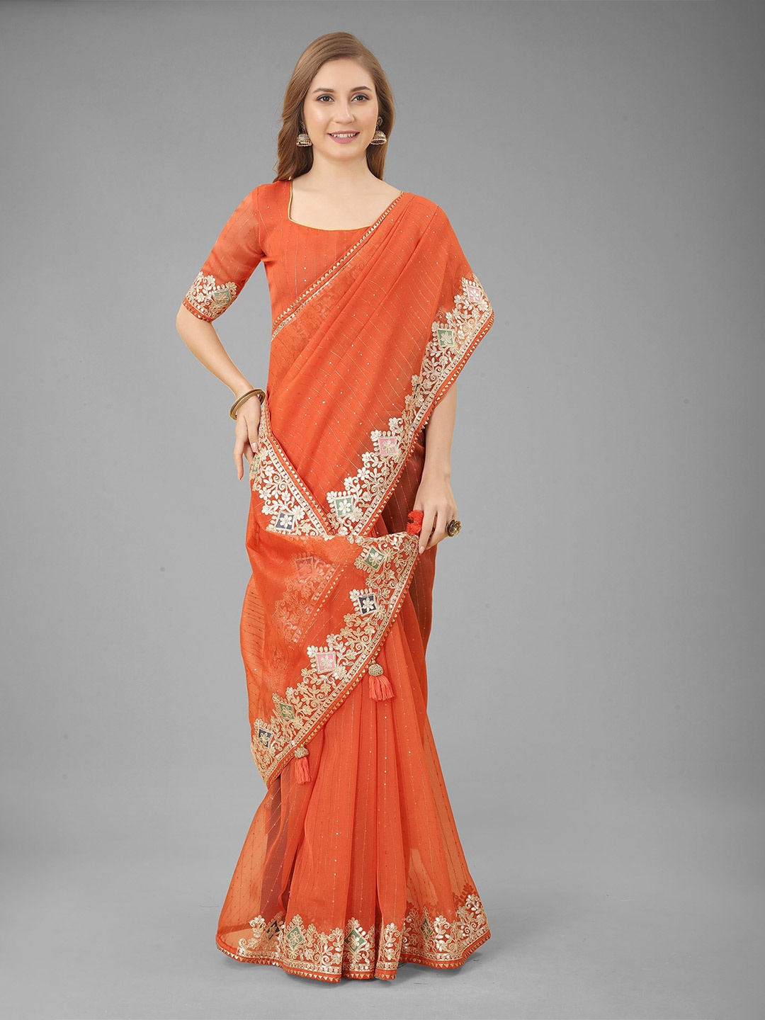 

N N ENTERPRISE Orange & Gold-Toned Embellished Embroidered Net Saree