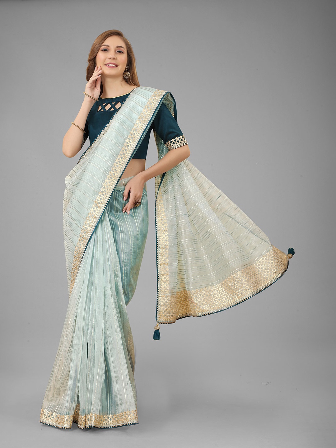 

N N ENTERPRISE Blue & Gold-Toned Striped Embroidered Net Saree