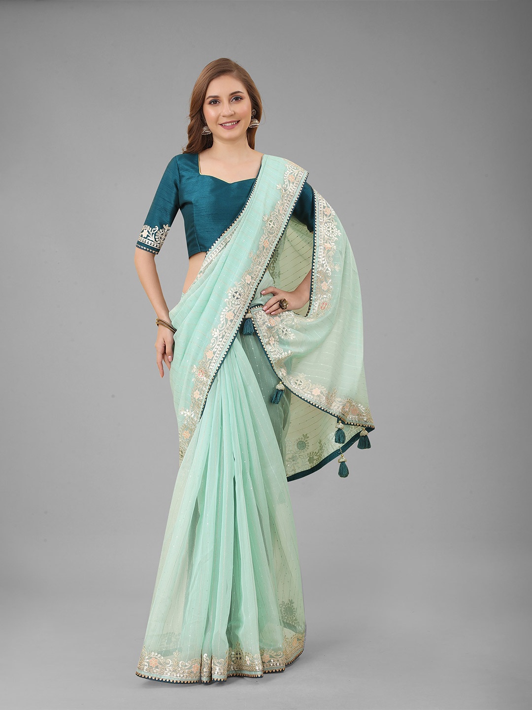 

N N ENTERPRISE Sea Green & Gold-Toned Embellished Embroidered Net Saree