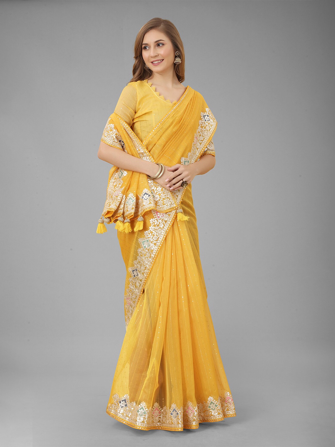

N N ENTERPRISE Yellow & Gold-Toned Embellished Embroidered Net Saree