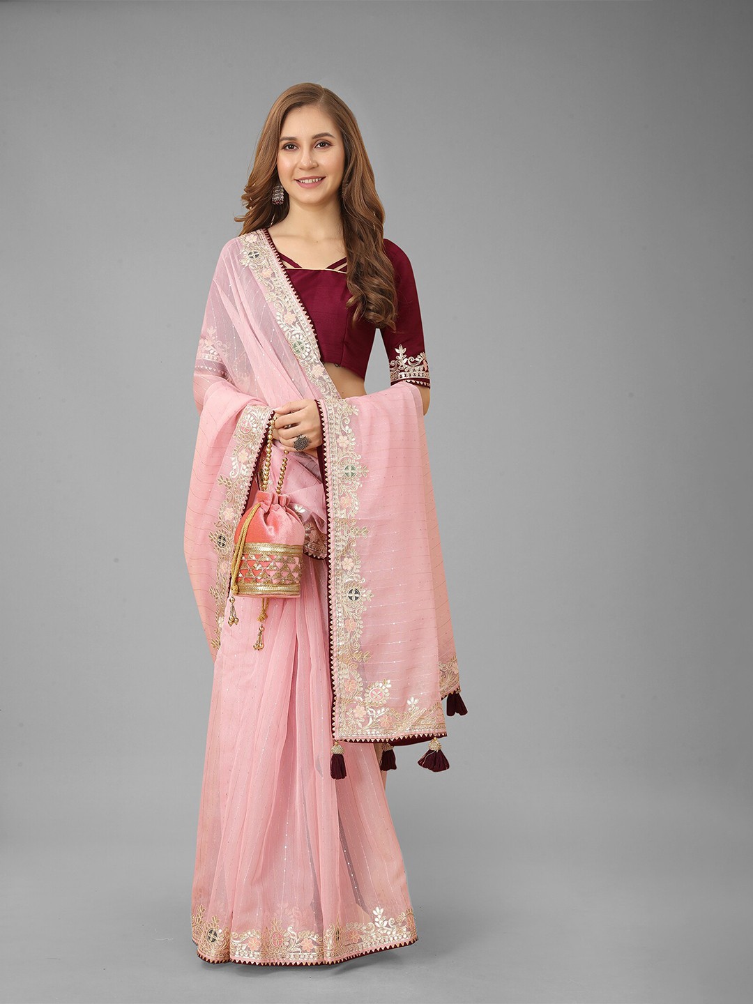 

N N ENTERPRISE Pink & Gold-Toned Ethnic Motifs Embellished Zari Net Saree