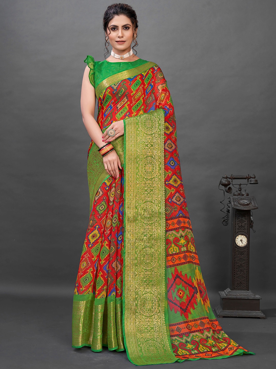 

Mitera Red & Green Ethnic Motifs Printed Zari Sungudi Saree