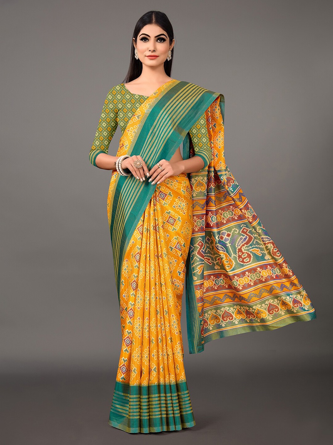 

Mitera Yellow & Green Ethnic Motifs Silk Blend Bagru Saree