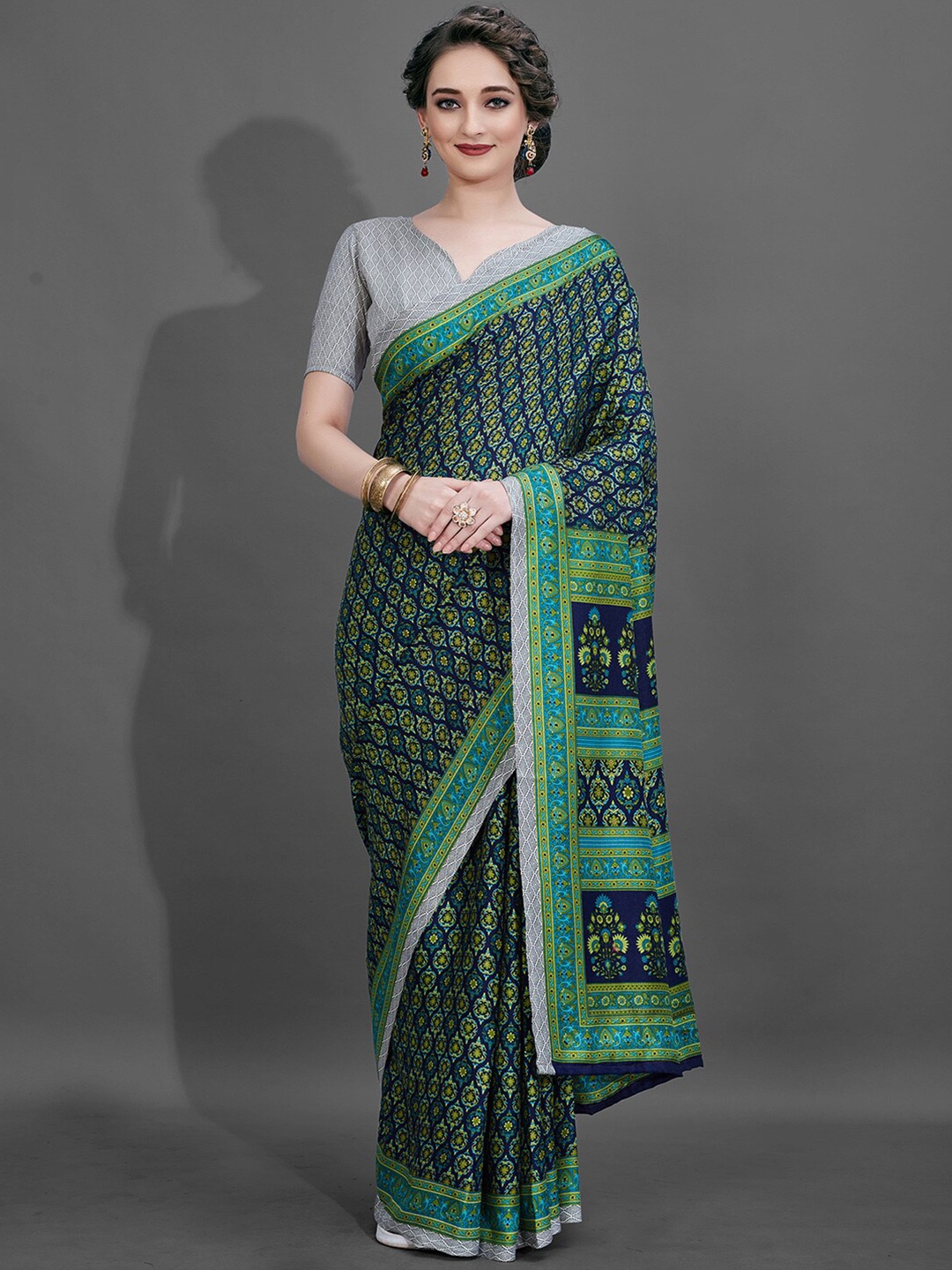 

Mitera Navy Blue & Green Dabu Pashmina Saree