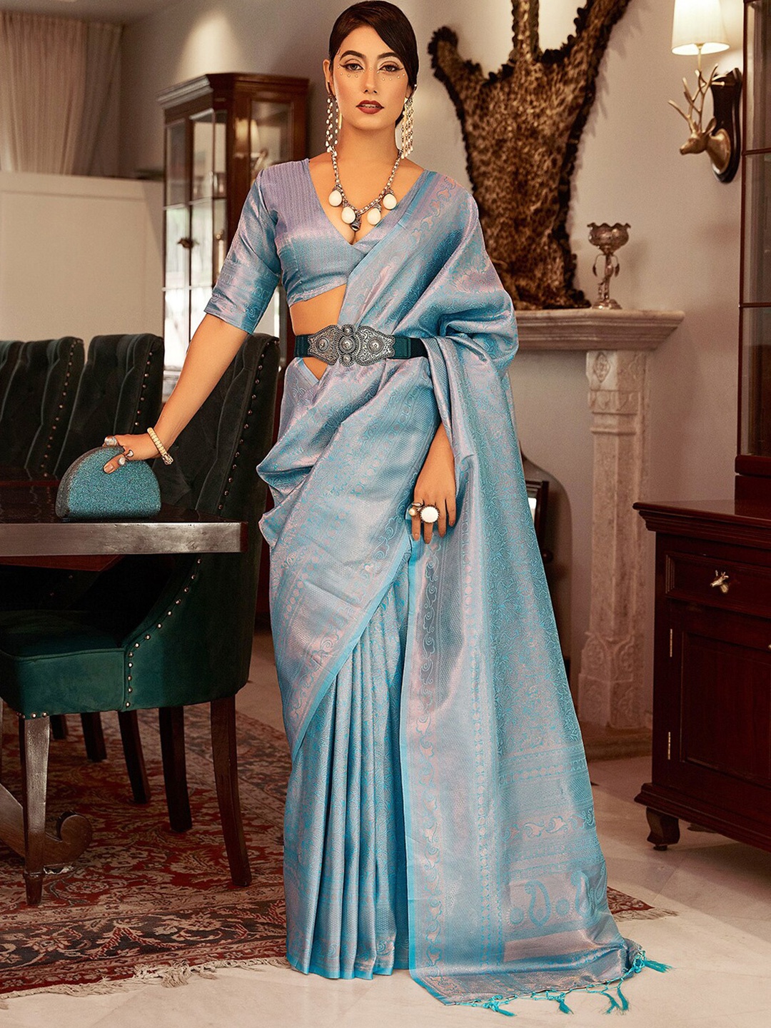 

Mitera Turquoise Blue & Silver-Toned Ethnic Motifs Woven Design Zari Saree