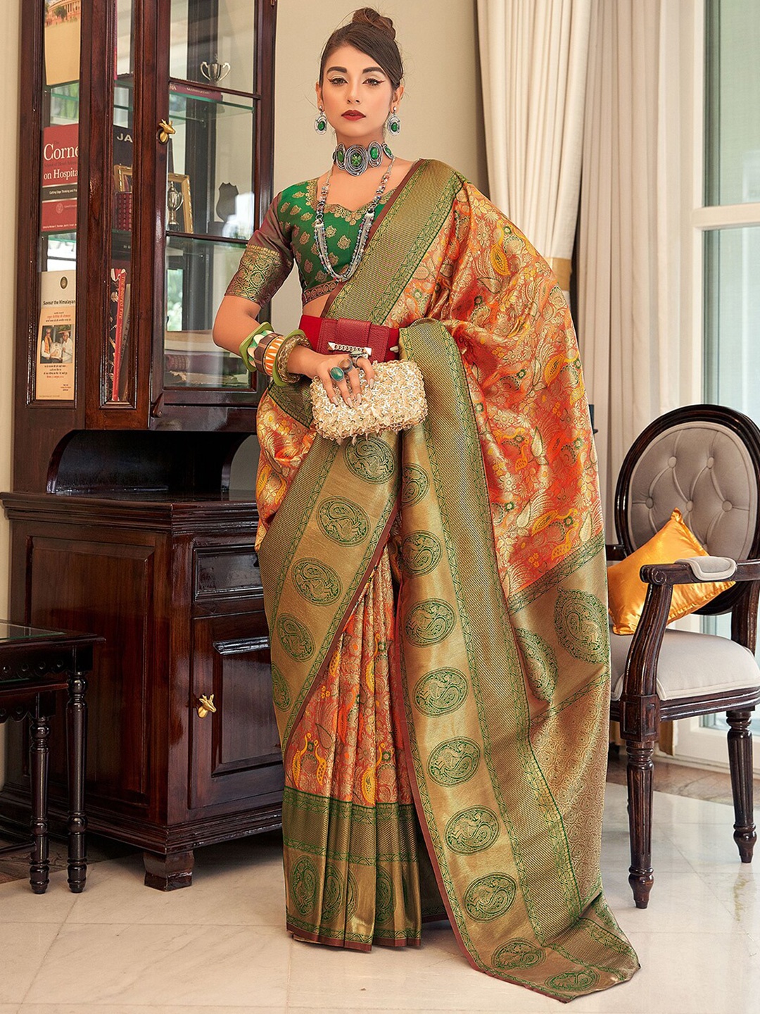 

Mitera Orange & Green Ethnic Motifs Woven Design Zari Paithani Saree