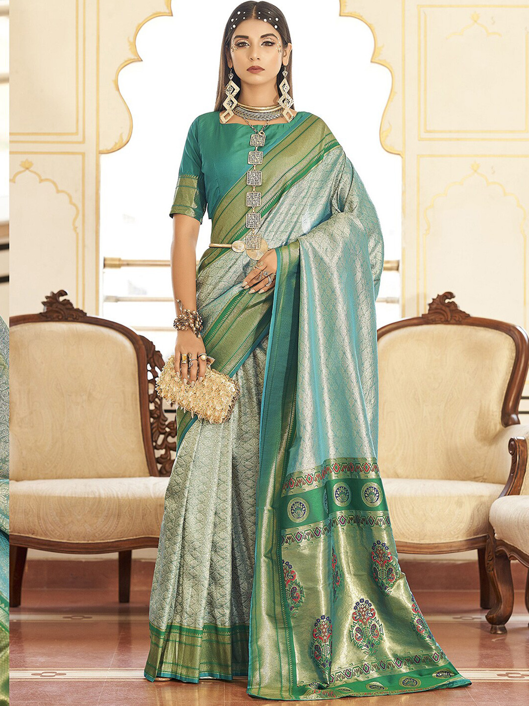 

Mitera Green & Blue Ethnic Motifs Woven Design Zari Art Silk Saree