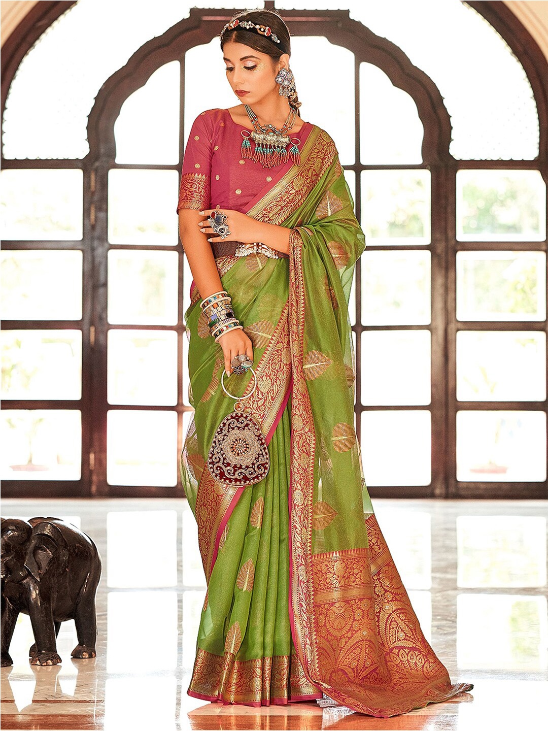 

Mitera Green & Maroon Ethnic Motifs Woven Design Organza Zari Saree