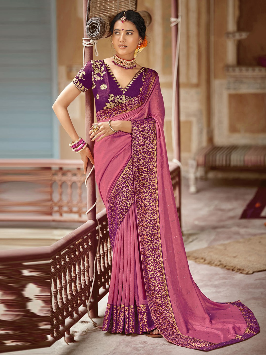 

Mitera Pink & Purple Ethnic Motifs Printed Saree